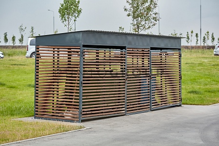 Fencing for containers of solid waste